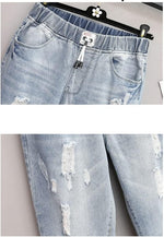 Plus Size Ripped High-Waisted Jeans - Edgy Fall Denim Style