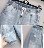 Plus Size Ripped High-Waisted Jeans - Edgy Fall Denim Style